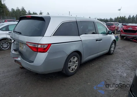 2011 Honda Odyssey Lx z USA, uszkodzony, nr VIN 5FNRL5H2XBB065217